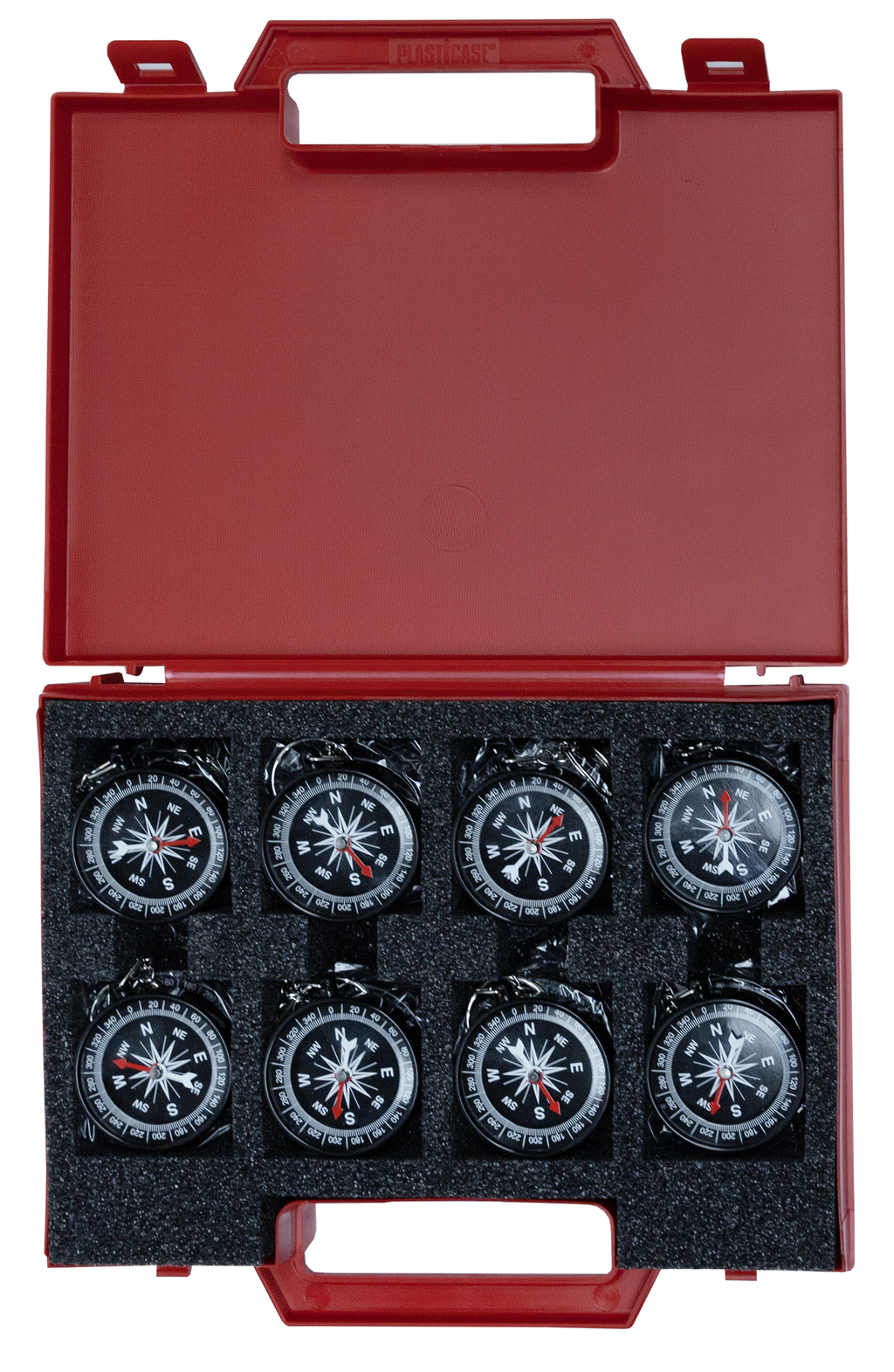 Das Bild zeigt ein rotes Kunststoffgehäuse, das acht Kompasse enthält. Die Kompasse sind in Schaumstofffächern angeordnet und verfügen über eine klare Richtungsanzeige.