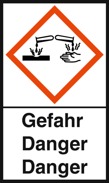 Das Bild zeigt ein Sicherheitssymbol, das auf ein chemisches Risiko hinweist. Es illustriert die Gefahr von Dämpfen oder Reaktionen zwischen Chemikalien und zeigt eine Hand, die vor einer potenziell schädlichen Substanz gewarnt wird.