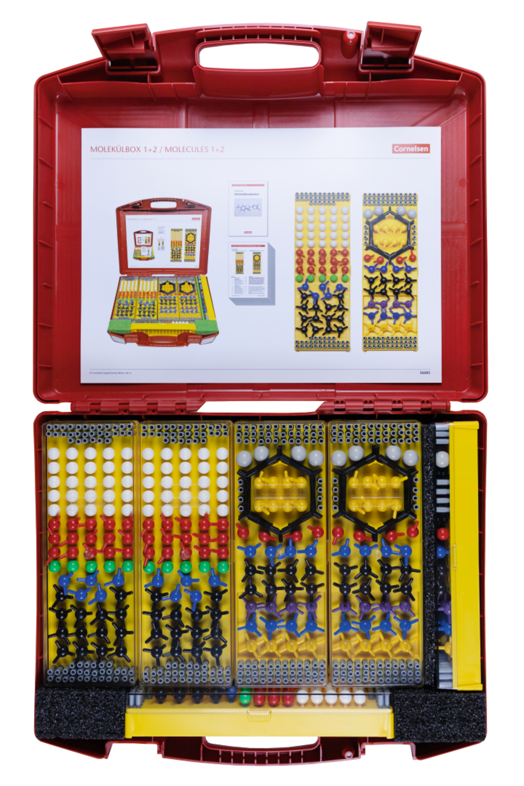 Das Bild zeigt eine rote Box mit dem Titel "Molekülbox 1+2", die verschiedene bunte Bausteine zur Darstellung von Molekülen enthält. Die Box ist geöffnet und präsentiert eine Anleitung sowie verschiedene Elemente in unterschiedlichen Farben und Formen für chemische Experimentierzwecke.