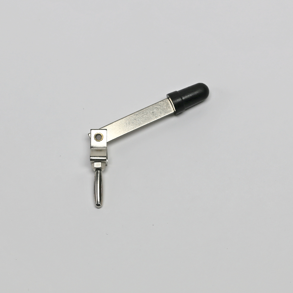 Das Bild zeigt ein metallisches Experimentiergerät mit einem beweglichen Arm und einer Gummikappe am Ende. Es scheint für den Einsatz im Bildungsbereich gedacht zu sein, möglicherweise zur Durchführung von physikalischen Experimenten.