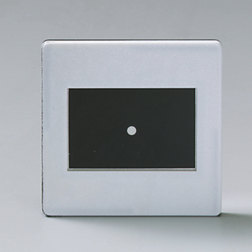 Das Bild zeigt ein rechteckiges Experimentierset mit einem weißen Punkt auf einem schwarzen Hintergrund. Der Rahmen ist silbern und scheint für educational purposes im Schulumfeld konzipiert zu sein.