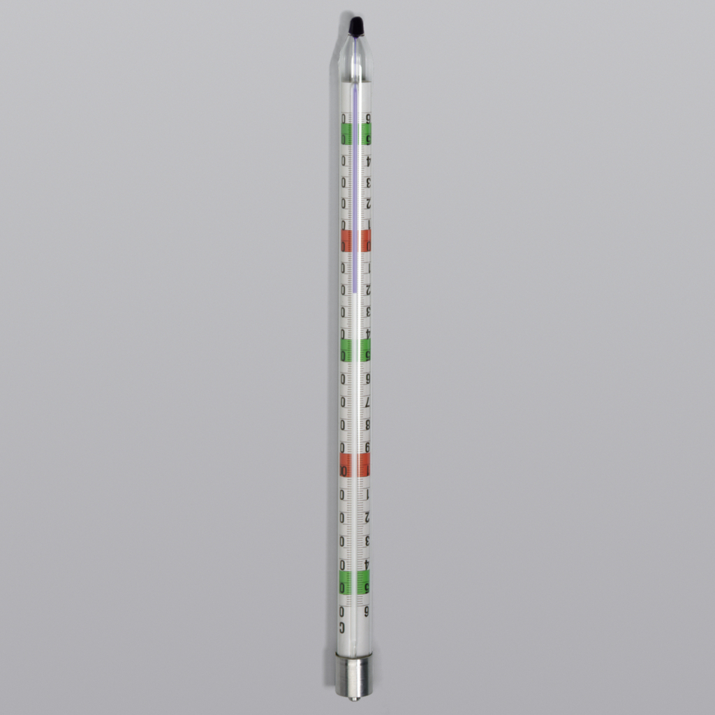 Das Bild zeigt ein Thermometer mit einer markierten Skala, die in verschiedenen Farben unterteilt ist. Es dient zur Messung der Temperatur und könnte für Experimente im Bildungswesen verwendet werden.