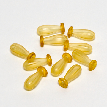 Auf dem Bild sind zehn gelbe Kunststoffobjekte in Tropfenform zu sehen, die am oberen Ende eine größere Öffnung haben. Diese Objekte könnten für Experimente oder im Bildungsbereich verwendet werden und sind auf einem weißen Hintergrund angeordnet.