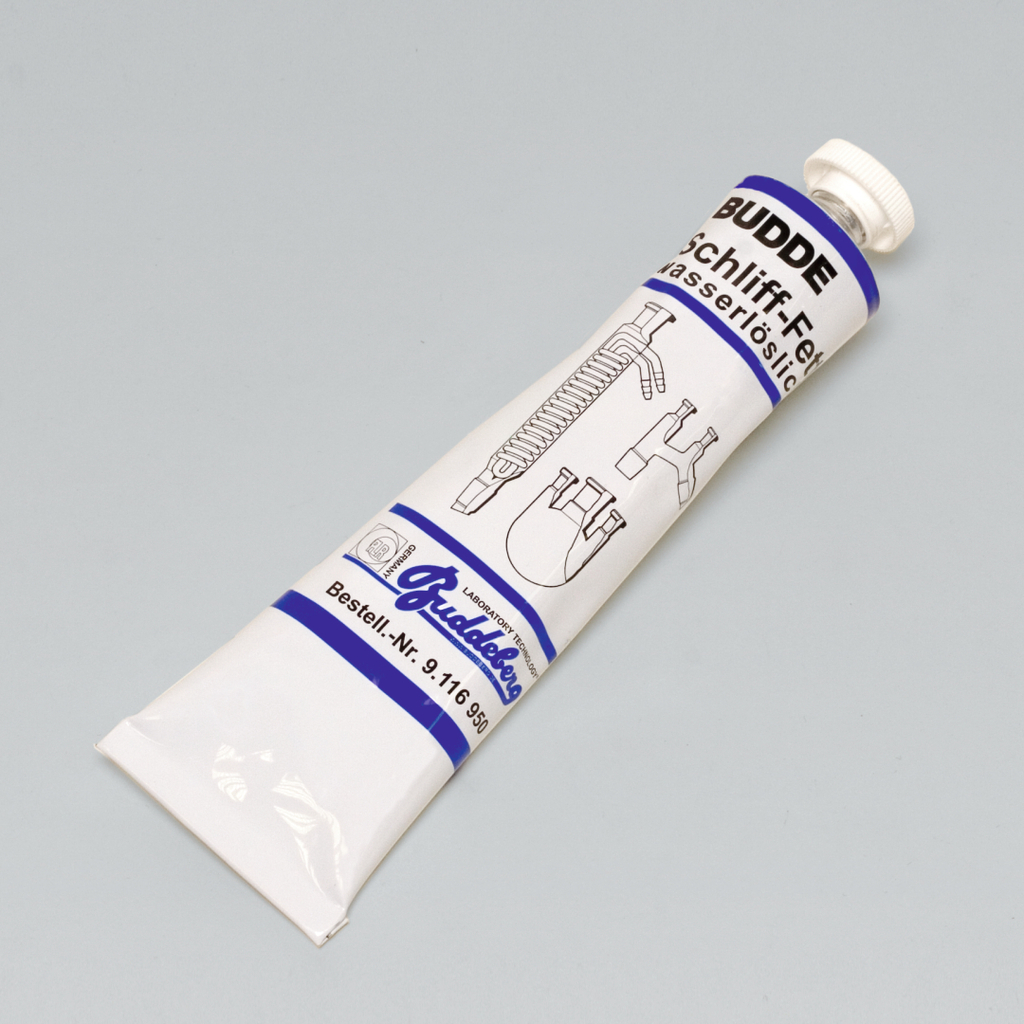 Das Bild zeigt eine Tube mit wasserlöslichem Experimentiermaterial, das für den Unterricht im deutschen Bildungswesen konzipiert ist. Auf der Verpackung sind Skizzen von Laborausrüstung abgebildet, die die Anwendung des Inhalts veranschaulichen.