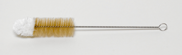 Das Bild zeigt eine Reinigungsbürste mit einem langen, dünnen Griff und einer Bürstenfläche aus hellen und weißen Borsten. Diese Art von Bürste wird häufig in Experimenten und in der Laborarbeit verwendet, um Glaswaren oder andere sehr feine Materialien zu reinigen.