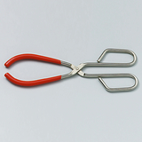 Das Bild zeigt eine hochwertige Zange mit roten, rutschfesten Griffen und einem glänzenden Metallkörper. Sie eignet sich ideal für verschiedene experimentelle Anwendungen im Bildungsbereich.