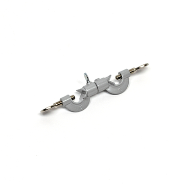 Das Bild zeigt ein graues Experimentiergerät mit zwei Halterungen und einem zentralen Verbindungselement. Es wird häufig im Bildungsbereich verwendet, um Versuchsanordnungen zu stabilisieren oder zu verbinden.