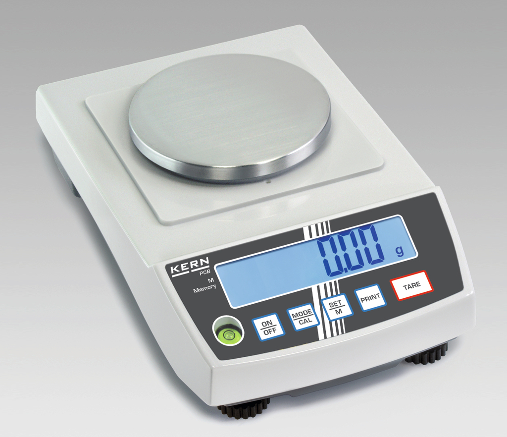 Das Bild zeigt eine digitale Laborwaage mit einer runden Metallwaage und einer gut lesbaren LCD-Anzeige, die in Gramm misst. Die Oberfläche der Waage ist in einem modernen Design gehalten und bietet verschiedene Tasten für Funktionen wie Tara und Kalibrierung.