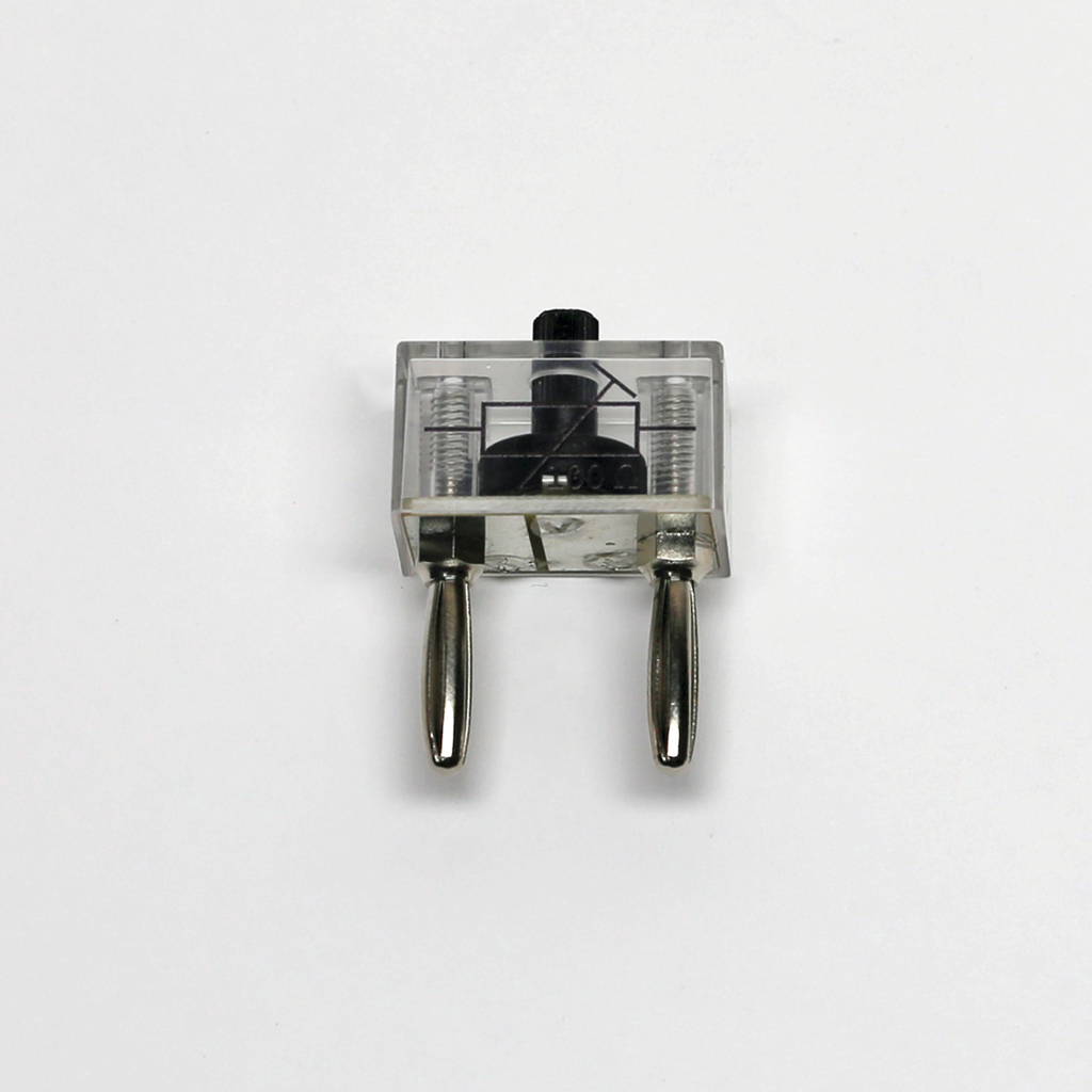 Das Bild zeigt ein transparentes Messgerät zur Bestimmung des elektrischen Stroms. Es verfügt über zwei Anschlüsse für die Strommessung und einen verstellbaren Knopf zur Kalibrierung.