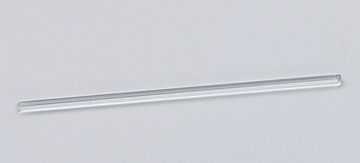 Das Bild zeigt ein langes, transparentes Glasröhrchen, das typischerweise in Experimenten verwendet wird. Es dient wahrscheinlich zur Durchführung chemischer Analysen oder als Gefäß für Flüssigkeiten.