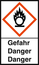 Das Bild zeigt ein Sicherheitszeichen, das vor brennbaren Gasen oder chemischen Stoffen warnt. Es ist in einem diamantförmigen Rahmen gestaltet und enthält die Aufschrift „Gefahr“ sowie die Übersetzung „Danger“ in zwei Sprachen.